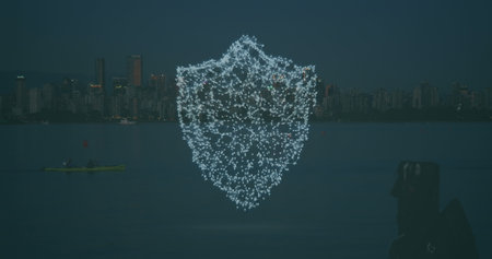 Image of digital shield over cityscape. global business and digital interface concept digitally generated image.の写真素材