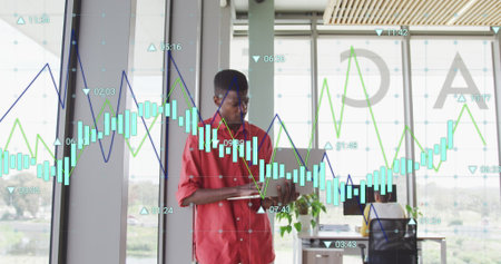 Image of data processing over african american men using laptop. Global business concept digital...