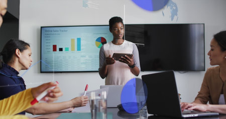 Image of data processing over diverse business people talking in office. Global business and digital...