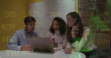 Image of stock market data processing over three diverse colleagues discussing over laptop. Global economy and business technology conceptの写真素材