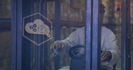 Image of data processing over african american male worker in warehouse. Global business and digital interface concept digitally generated image.の写真素材