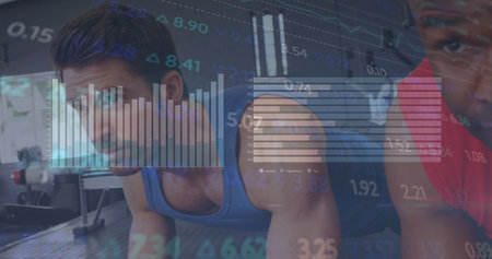 Image of graphs and numbers over multiracial athletes doing plank exercise in gym. Digital...