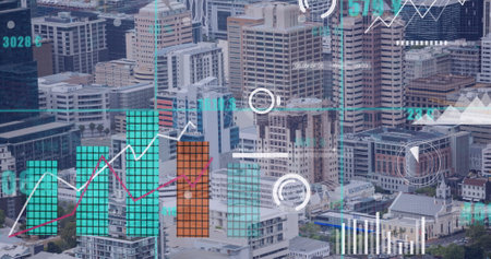 Image of icons and data processing over cityscape. Global business, digital interface, finances, computing and data processing concept digitally generated image.の写真素材