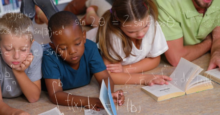 Image of math formulas over diverse children reading books at school. learning, education and school...