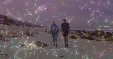 Caucasian senior couple hiking in countryside, over colourful moving network of connections. active...