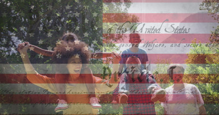 Image of american flag over family walking in garden and smiling. patriotism and celebration concept...