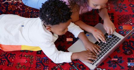 Image of social media notifications over biracial brother and sister using laptop. Childhood,...
