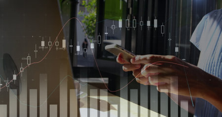 Digital composite of a woman using a smart phone and laptop while graph move in the screen 4k