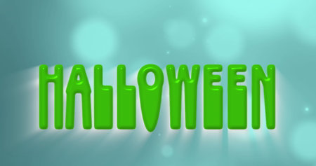Image of halloween text banner over spots of light against blue background. Halloween holiday and celebration conceptの写真素材