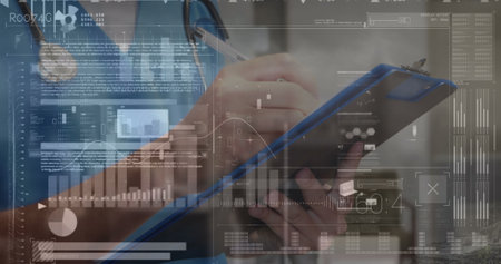 Image of financial data processing over caucasian doctor holding clipboard and taking notes. Global medicine, computing and digital interface concept digitally generated image.の写真素材