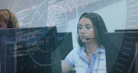 Image of data processing over caucasian woman talking on phone headset at office. Business data and...