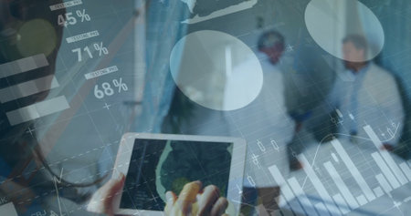 Image of data processing over diverse male and female doctors in hospital. Medicine, healthcare, hospital, computing, communication and digital interface concept digitally generated image.の写真素材