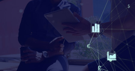 Image of web of connections with icons floating over two people using a digital tablet. Global...
