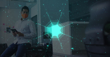 Globe of network of connections against man wearing face mask using digital tablet at office....