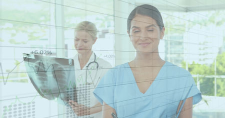 Image of data processing over diverse female doctors in hospital. Medicine, healthcare, hospital,...