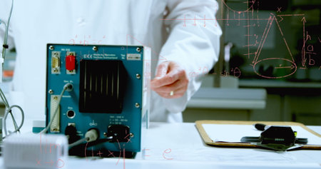 Image of mathematical equations over caucasian male scientist in lab. global science and digital...