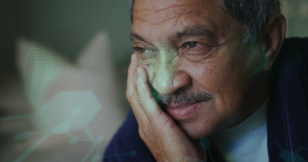 Image of data processing over senior biracial man smiling. Global business and digital interface...