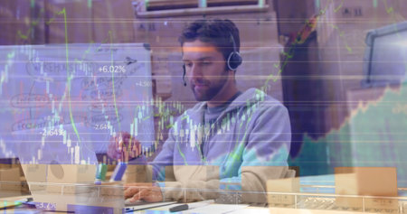 Image of data processing over caucasian male worker in warehouse. Global business and digital interface concept digitally generated image.の写真素材