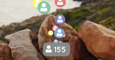 Image of social media icons over shore and sea landscape. Global social media, communication and connections concept digitally generated image.の写真素材