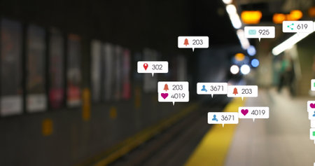 Image of social media icons and numbers over out of focus train platform. global social media, networking, connections and digital interface concept digitally generated image.の写真素材
