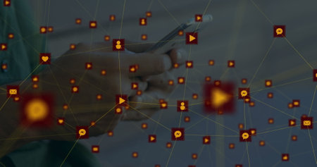 Image of network of digital icons against mid section of a man using smartphone. Global networking and business technology conceptの写真素材