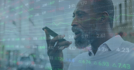 Image of data processing over african american man using smartphone. Global connections, computing, digital interface and data processing concept digitally generated image.の写真素材