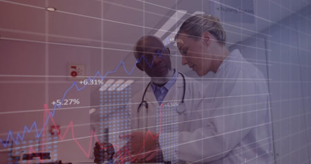 Image of graphs, changing numbers over diverse doctors standing and discussing patient reports. Digital composite, multiple exposure, report, business, growth, teamwork, medical and healthcare.の写真素材