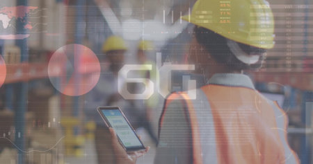 Image of statistic charts over african american workers in warehouse. Global finance, statistics, computing and data processing concept digitally generated image.の写真素材