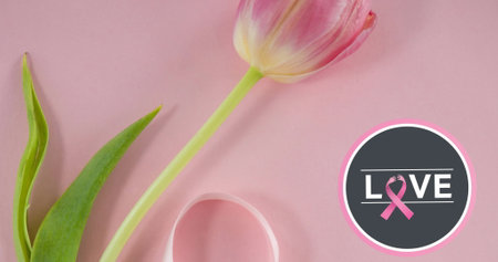 Image of breast cancer awareness text over flower and pink breast cancer ribbon. breast cancer positive awareness campaign concept digitally generated image.の写真素材