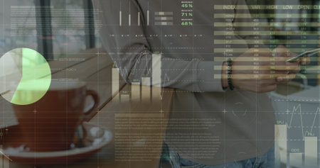 Image of statistics and data processing over man using smartphone. Global business connections digital interface and technology concept digitally generated image.の写真素材