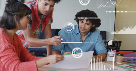 Image of financial data processing over diverse business people in office. Global finance, business, connections, computing and data processing concept digitally generated imageの写真素材