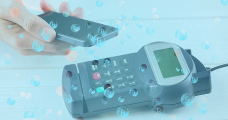 Image of bitcoins over smartphone and payment terminal. global data security, finance and...