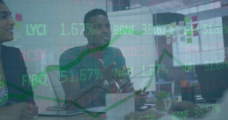 Image of financial data processing over diverse business people in office. Global finance, business, connections, computing and data processing concept digitally generated image.の写真素材