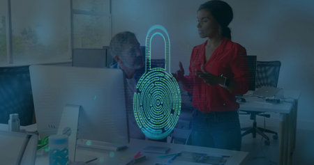 Image of padlock over diverse business people using computer and talking in office. Global business,...