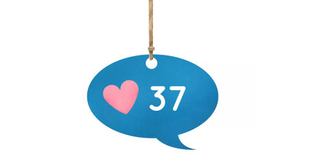 Digital image of increasing numbers and heart icon inside a tied up blue speech balloon on a white...