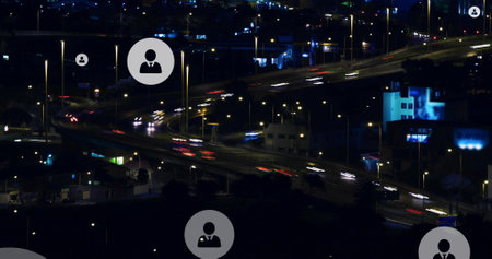 Image of multiple profile icons over time lapse of moving vehicles on bridge in city. Digital composite, multiple exposure, business, shape, abstract, transportation and technology concept.の写真素材