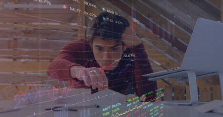 Image of financial data processing over caucasian businessman in office. Business, finance, data processing and networking concept digitally generated image.の写真素材