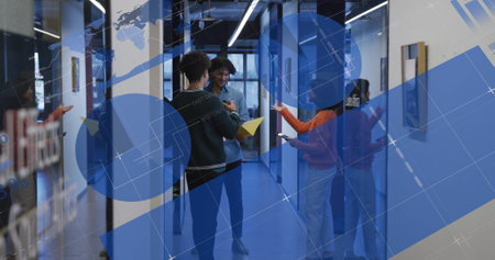 Image of multiple graphs and diverse colleagues discussing documents in office corridor. Digital...
