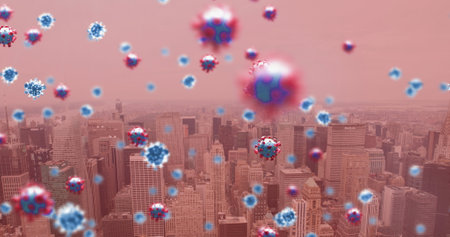 Image of covid 19 cells floating over cityscape on red background. global coronavirus covid 19 pandemic concept digitally generated image.の写真素材