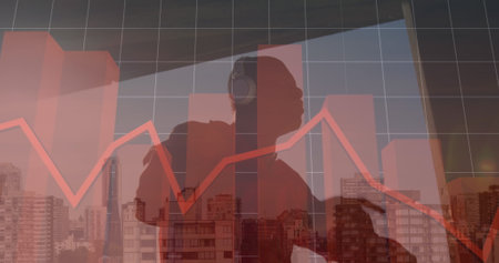 Image of financial graphs and data over cityscape and hiker. Global finance, economy and business concept digitally generated image.の写真素材