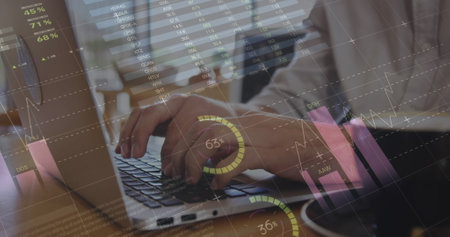 Image of statistics and data processing over businessman using laptop. global business, data...