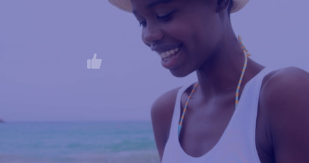 Image of social media reactions over hands of biracial woman using smartphone. Social media,...