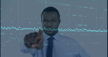 Image of financial data over african american businessman. global business, finance, technology and...