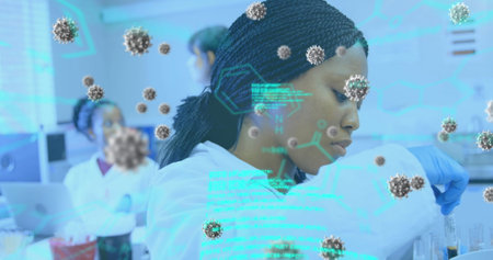 Image of coronavirus cells and data flowing over a female laboratory workers group examining samples. Covid 19 pandemic health care science medicine concept digital composite.の写真素材