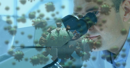 Image of coronavirus cells flowing over a male laboratory worker during the research, using...