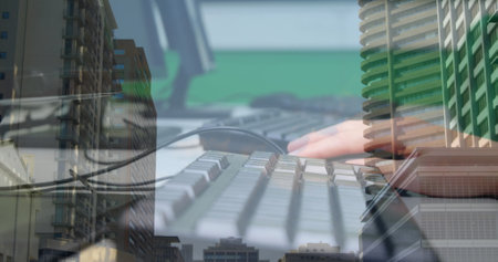 Image of woman typing on computer keyboard with cityscape in background. global shipping, delivery...