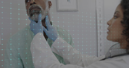 Image of cardiograph over diverse male patient and doctor treating. Medicine, health and digital...