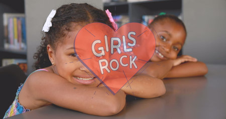 Image of girls rock text over school girls. female power, feminism and gender equality concept digitally generated image.の写真素材