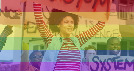 Image of rainbow over diverse protesters with banners. lgbt rights and equality concept digitally generated image.の写真素材
