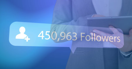 Image of digital interface Followers text and people icon with growing numbers on blue speech bubble over woman using digital tablet. Global social media network digitally generated image.の写真素材